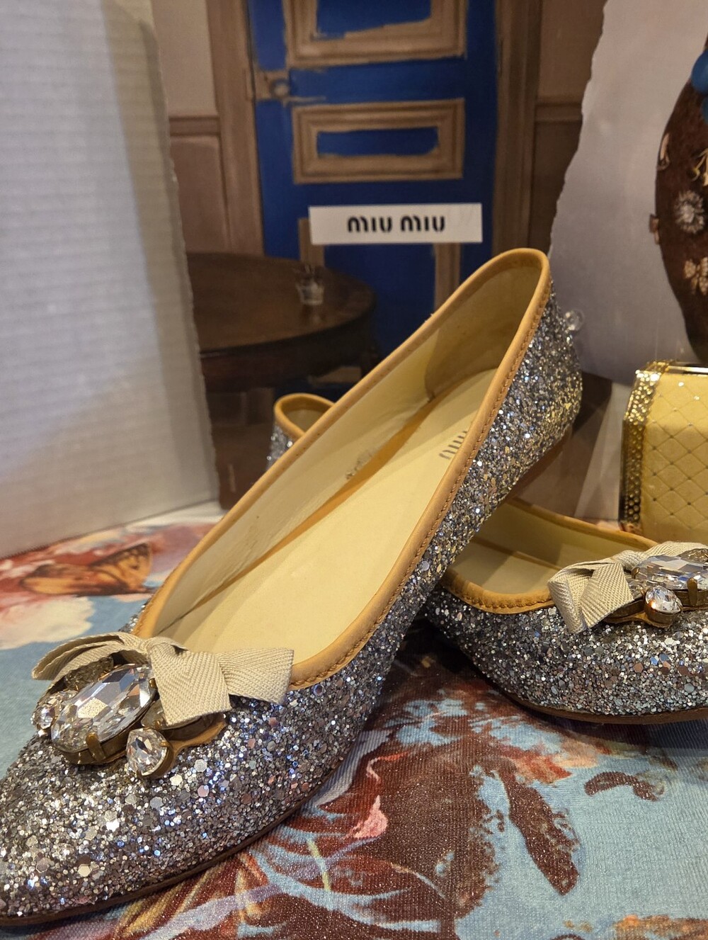 Miu Miu Silver Glitter Pointed Flat with Crystal Bow $386